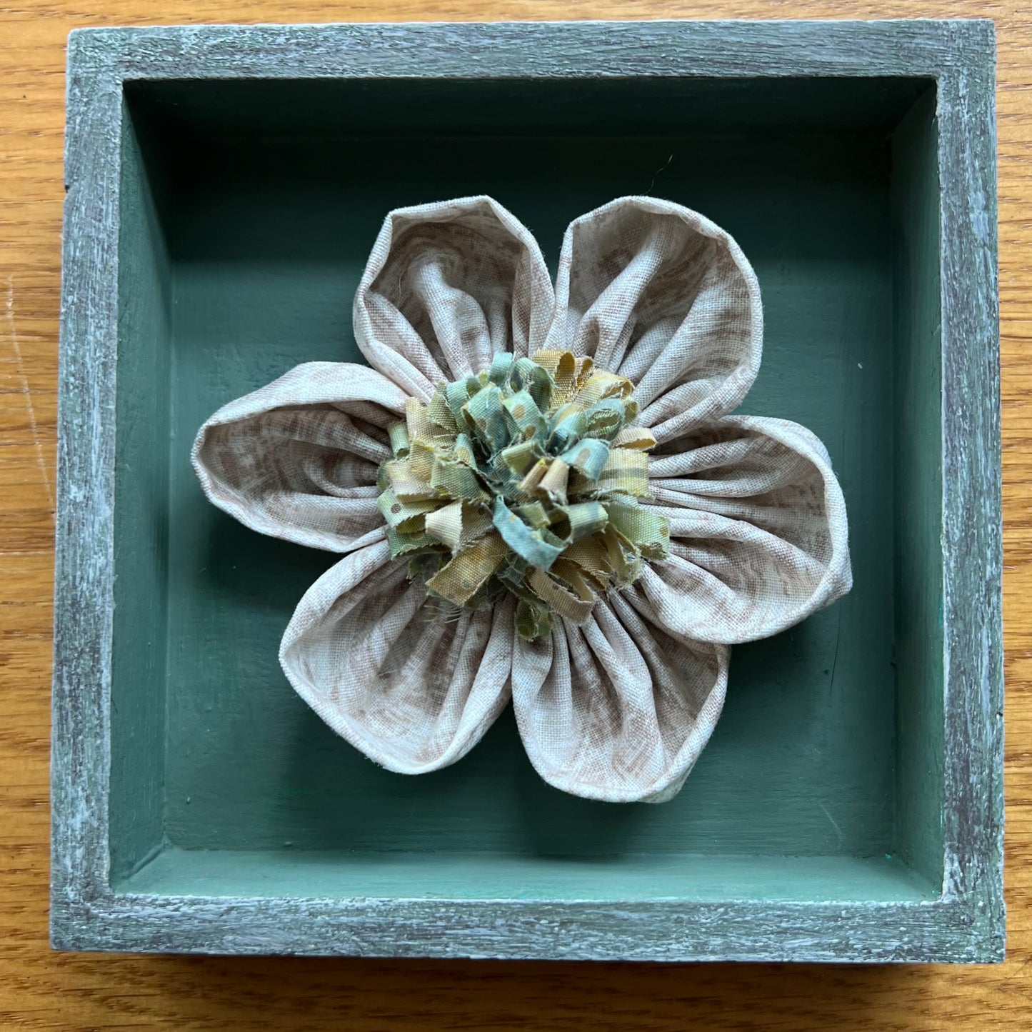 Hand painted 5x5x1" Mini Meadow wooden shadow box featuring hand-sewn 3D textile flower made with reclaimed fabric.