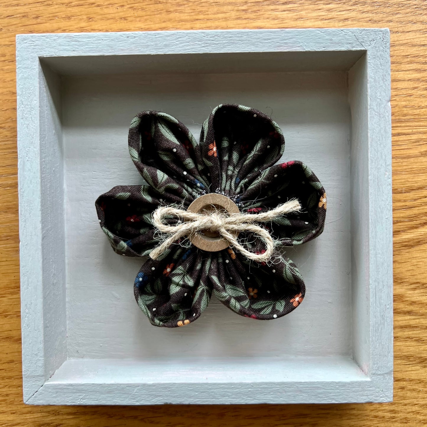 Hand painted 5x5x1" Mini Meadow wooden shadow box featuring hand-sewn 3D textile flower made with reclaimed fabric.