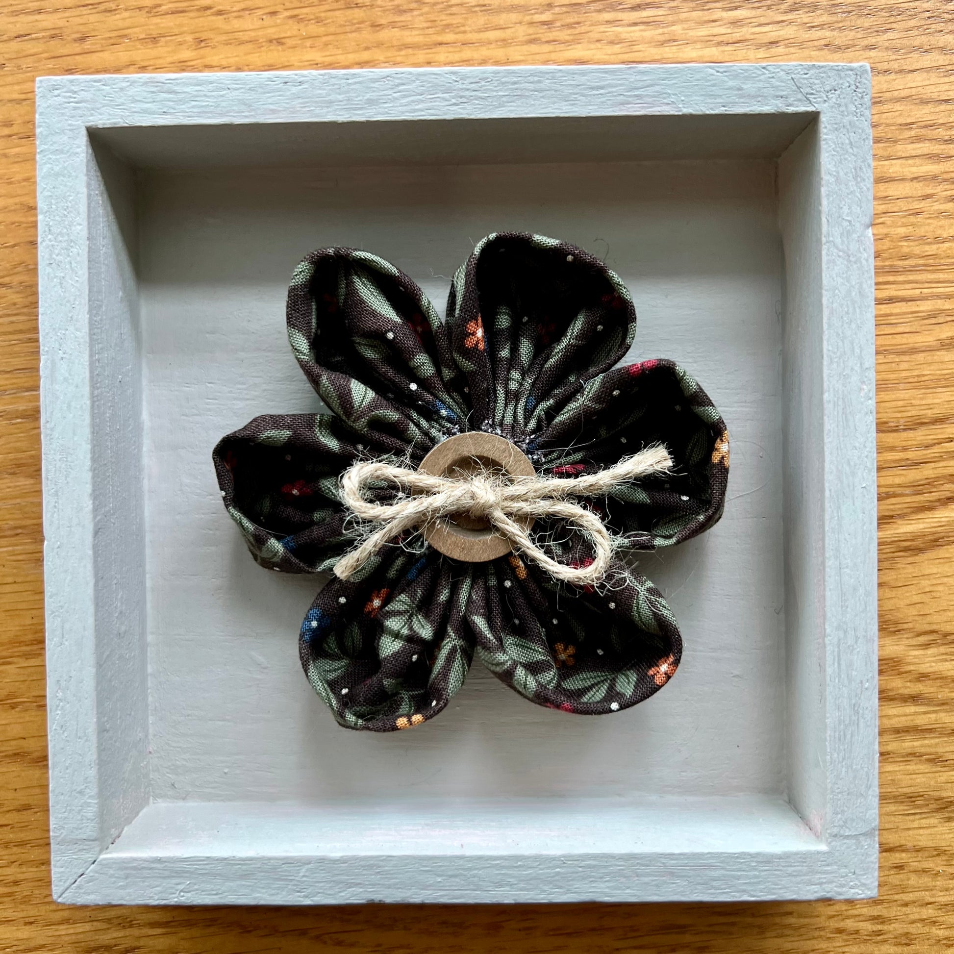 Hand painted 5x5x1" Mini Meadow wooden shadow box featuring hand-sewn 3D textile flower made with reclaimed fabric.