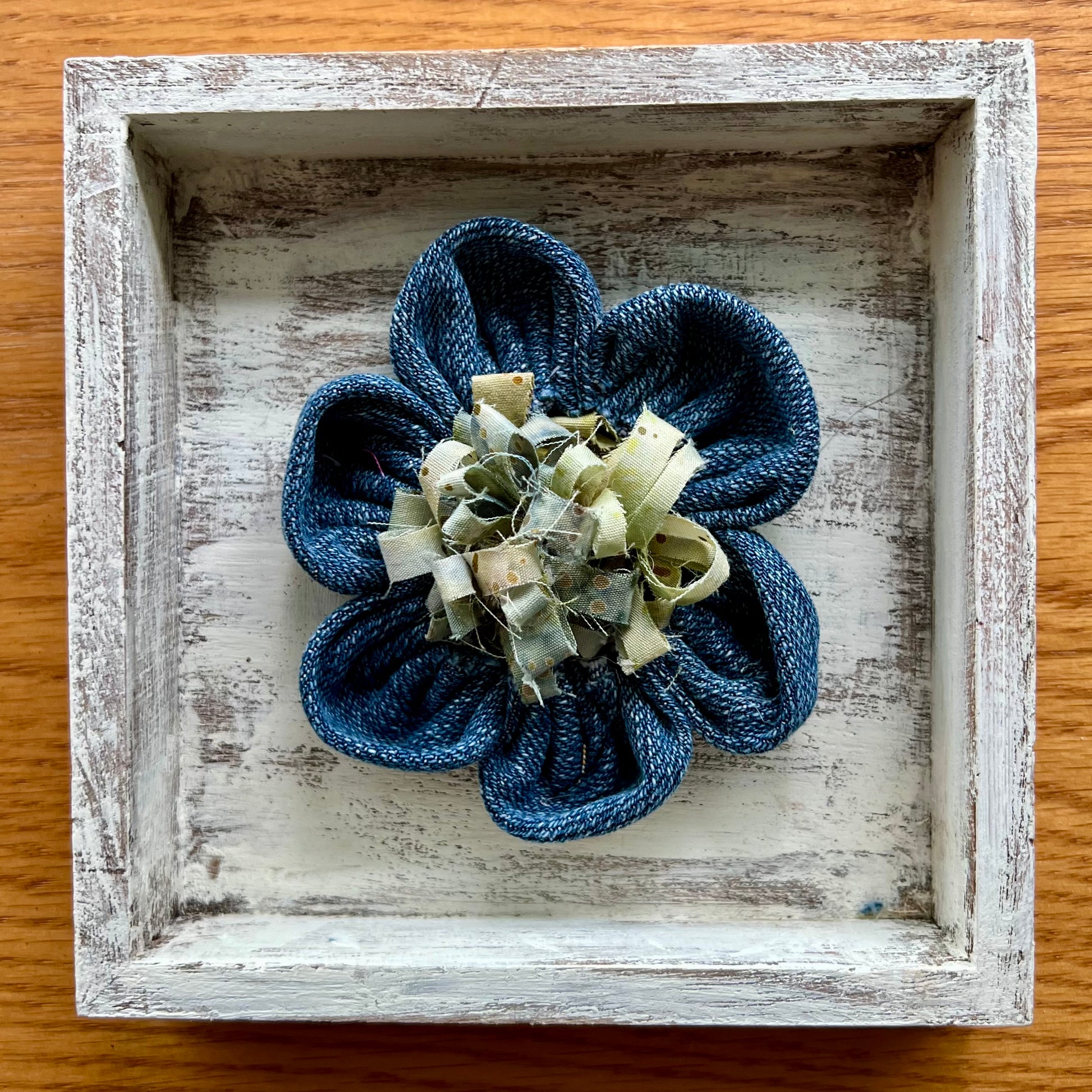 Hand painted 5x5x1" Mini Meadow wooden shadow box featuring hand-sewn 3D textile flower made with reclaimed fabric.