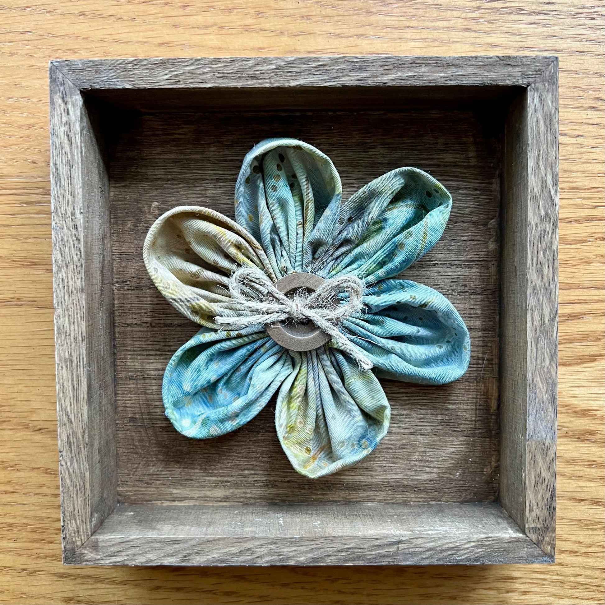 Hand painted 5x5x1" Mini Meadow wooden shadow box featuring hand-sewn 3D textile flower made with reclaimed fabric.