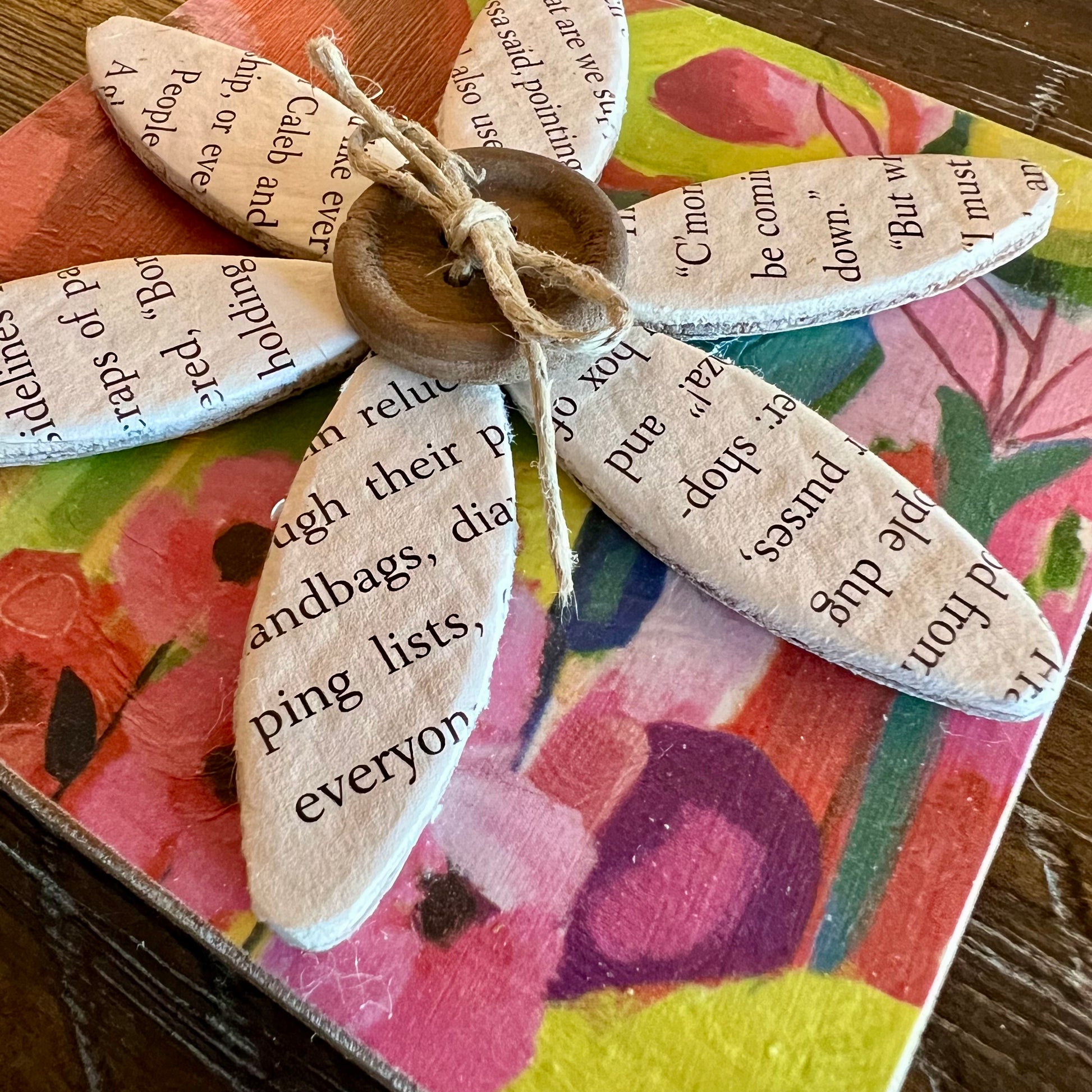 Closeup of literary bloom magnet.