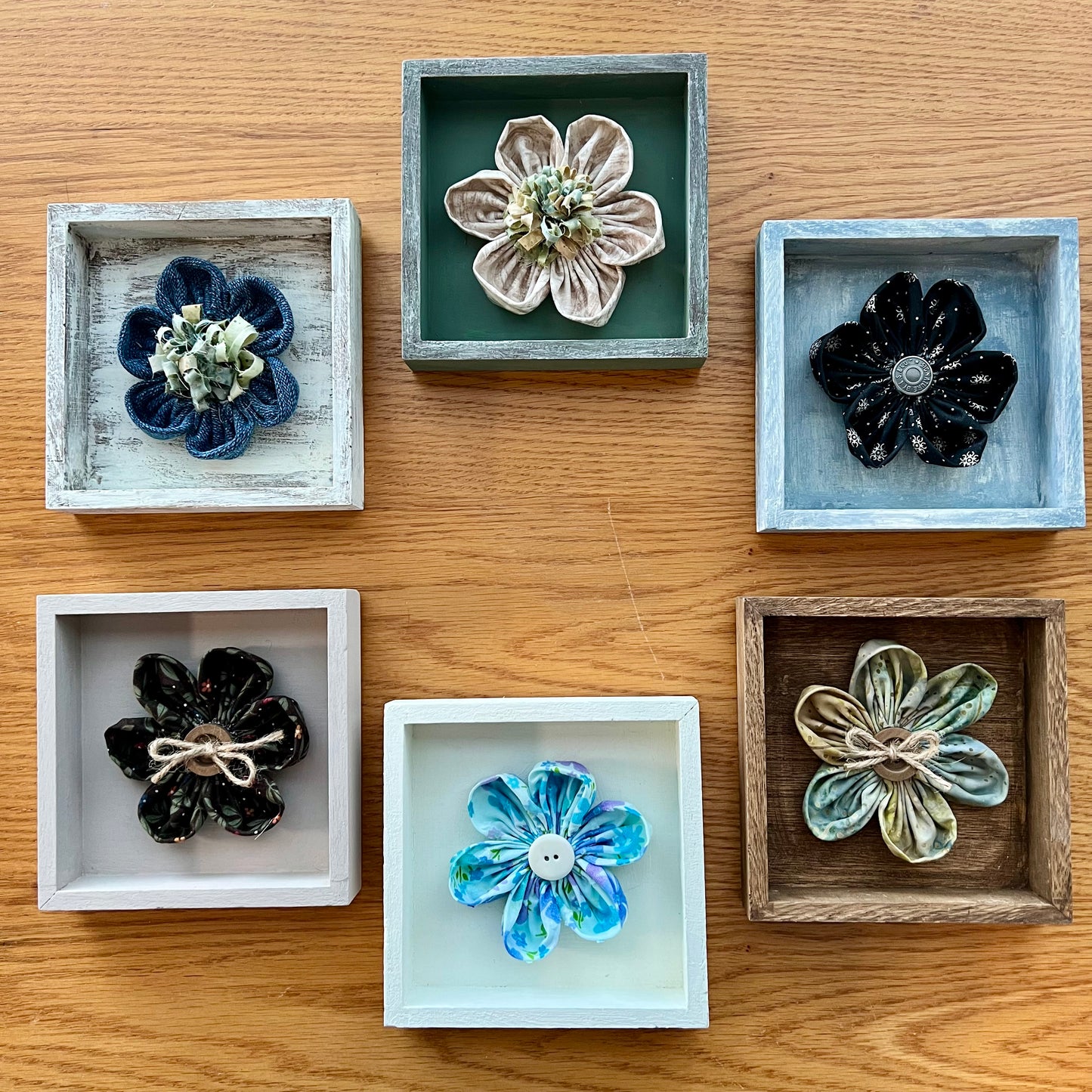 Six Mini Meadow Shadowboxes displaying a variety of colors, textures, fabrics, and patterns.