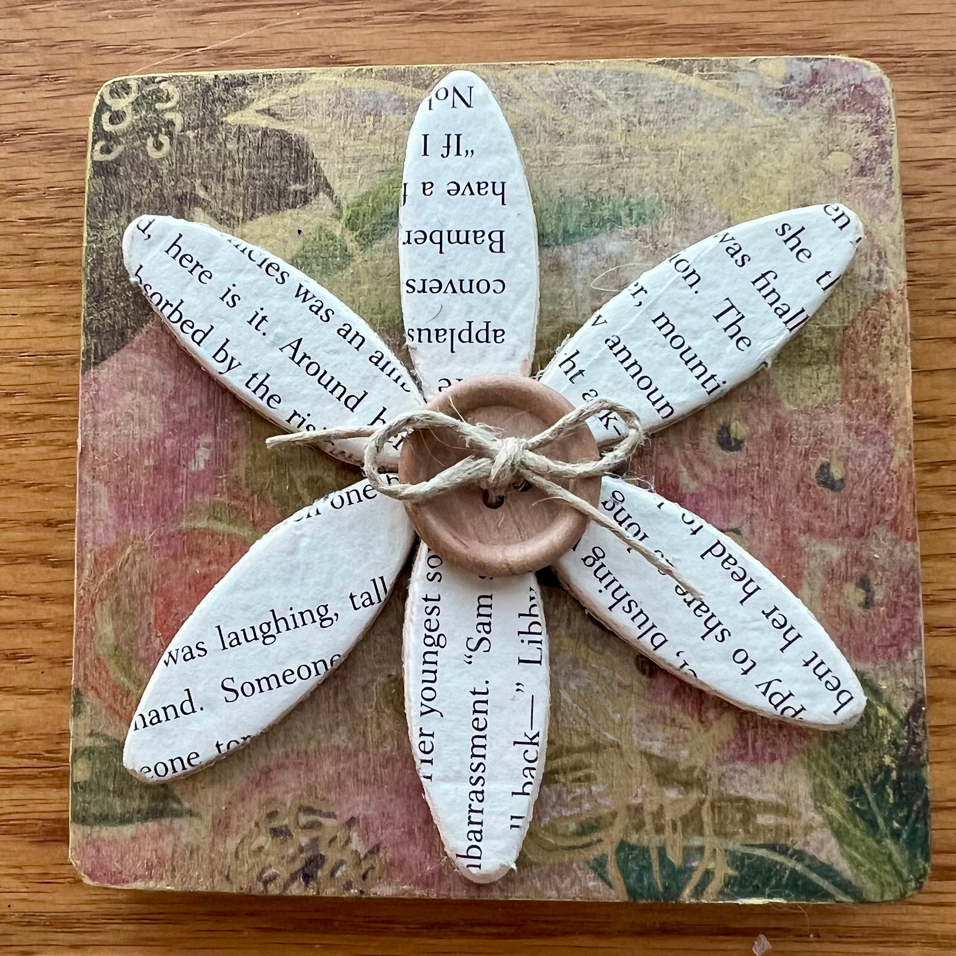 Literary Bloom magnet: Wood magnet art featuring 3D accents, repurposed book pages, and a floral background.